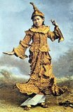 The origins of Burmese Dance are traced to the Pyu, Halin, and Mon cultures in the central and lower Irrawaddy regions from at least two centuries before the Christian era. Archaeological evidence shows Indian influences in this.<br/><br/>

There were also influences from Thai and Khmer cultures during the many invasions and counter-invasions that occurred over the next two millennia.There was a particularly well documented infusion of dance forms, such as the Yama Zatdaw (the Burmese version of the Ramayana) in 1767, when the Burmese sacked Ayutthaya and expropriated a large component of the Thai court. Nonetheless, some of the surviving forms (including the belu, nat gadaw and zawgyi dances) honour folklore characters that are quintessentially Burmese, some of these from pre-Buddhist times.<br/><br/>

There is also a close relationship between the classical Burmese marionette and human dance art forms, with the former obviously imitating human dance, but also with human dance imitating the movements of the marionette.