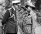 UK / Malaysia: Lord Louis Mountbatten inspects Malayan troops in Kensington Gardens, London. The men were in London to take part in the Victory Parade, which took place on 8 June, 1946.<br/><br/>

Admiral of the Fleet Louis Francis Albert Victor Nicholas George Mountbatten, 1st Earl Mountbatten of Burma, KG, GCB, OM, GCSI, GCIE, GCVO, DSO, PC, FRS (né Prince Louis of Battenberg; 25 June 1900 – 27 August 1979), was a British statesman and naval officer, and an uncle of Prince Philip, Duke of Edinburgh.
