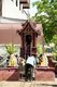 Thailand: Small spirit house next to the old wooden viharn, Wat Phan Tao, Chiang Mai